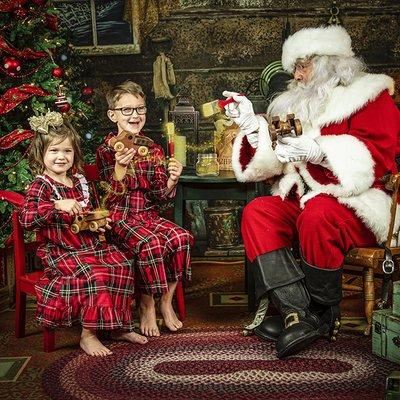 Helping Santa paint toys.