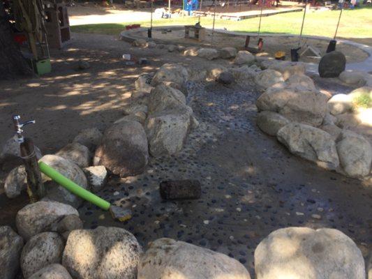 They have a fun little man-made river called the "mud pit" where kids dig their own moats and make sand castles and play in the dirt!