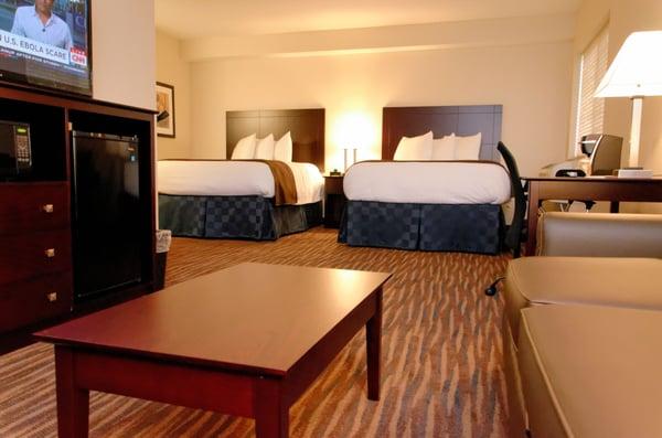 Family suite with two queen size beds and sofa bed.