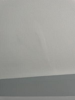 "patch work" on ceiling from crack they caused and claimed they couldn't fix.