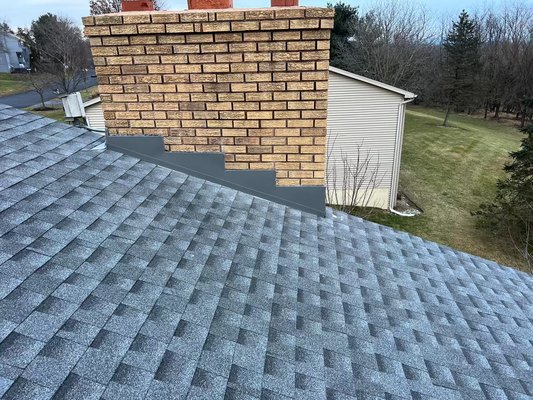 New GAF timberline shingles with custom made chimney flashing