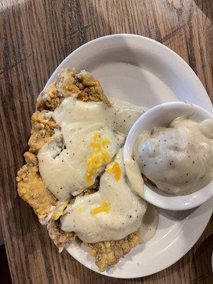 Green chili gravy over a chicken fried steak