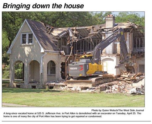 Demolition of a house in Port Allen, LA