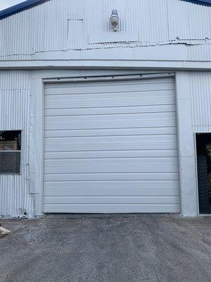 New 12'2" x 12' commercial ribbed sectional door