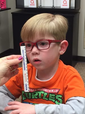 Getting fitted for his First pair of glasses