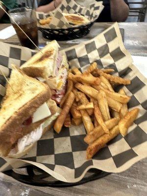 Club sandwich and fries