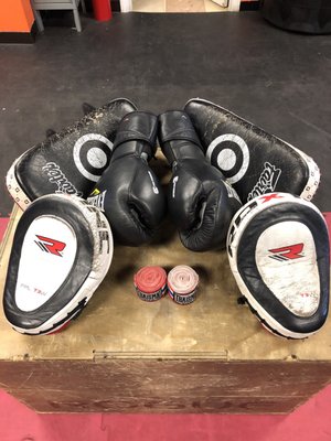 Extra gloves, wraps, Thai pads and focus mitts