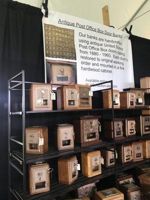 Antique post office box doors find new life as a coin bank.