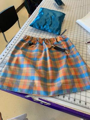 This is a finished design. A custom skirt she made for herself.