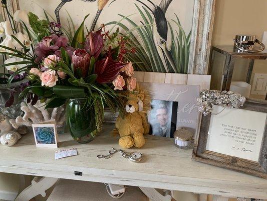 Exquisite flower arrangement and the softest Jellycat stuffed animal for the grandson.