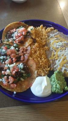 Beef tacos with rice and beans