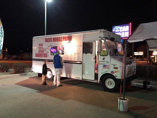 Taco truck outside their building