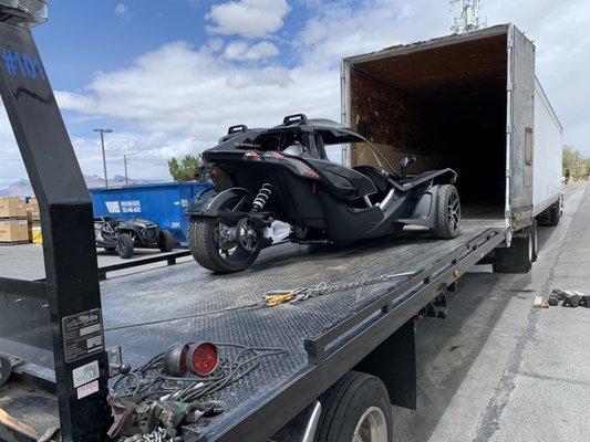 Unloading the vehicles in the trailer