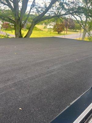 Replacement of the roofing to a higher-quality material for our flat roofs on our front porch and back basement entrance