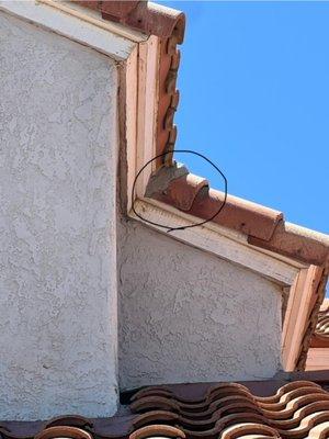 gray mortar on front right side of house