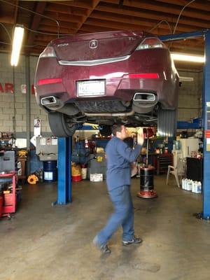 The chariot getting an oil change and shoes rotated   The coffee is good here too.