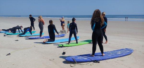 Blane and Nick teaching our crew how to surf!