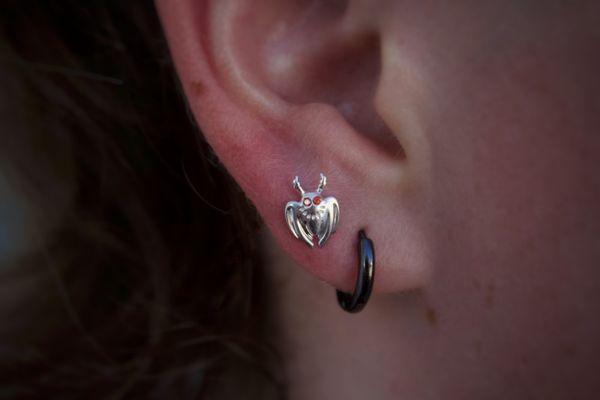 2nd Lobe Pierced with 14k White Gold Mothman design