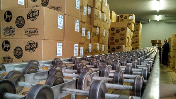 Inside the warehouse. A view of the conveyor and boxes.