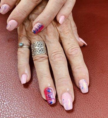 A 'surprise' creative touch!  by Tina, nail technician and salon owner.