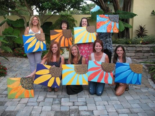 The courtyard at The Hub on Canal was blooming with flowers painted by this fun group!