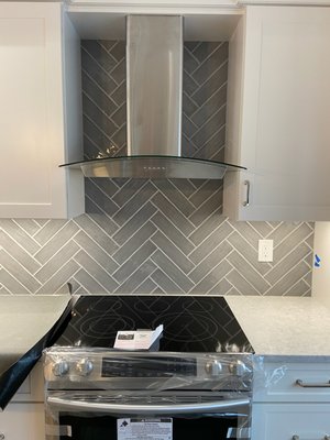 Herringbone pattern backsplash