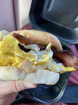 Breakfast sandwich with eggs and bacon