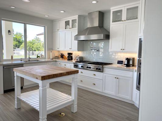 Elevate your kitchen with our cabinetry services and a custom-built prep table for culinary perfection.