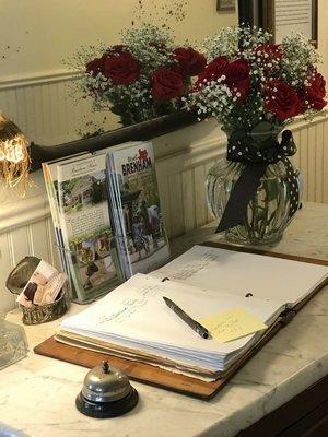 Brenham House sign in desk!