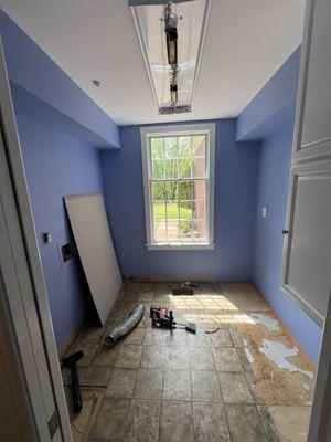 We painted the walls before customizing entire laundry room.