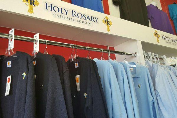 We supply school uniforms for Holy Rosary. Long and short sleeved polos, cardigans