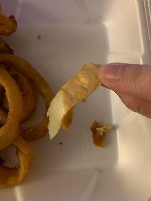 Inside of my onion ring... it's the part of the onion on the outside that you are suppose to PEEL OFF AND DISGARD.