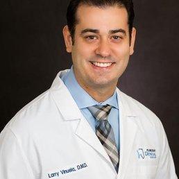 Dr.Larry Vinuela is the owner of Floridian Dental Group. He specializes in implants, fixed hybrid dentures, extractions