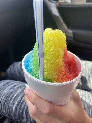 Rainbow snow cone - with a delicious big bite missing!