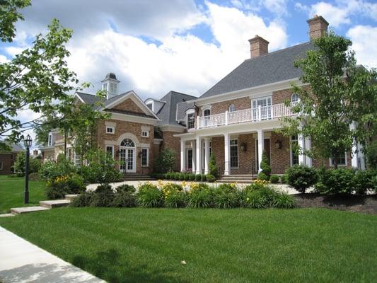 Front yard estate landscape in harmony with color, texture and plant form.