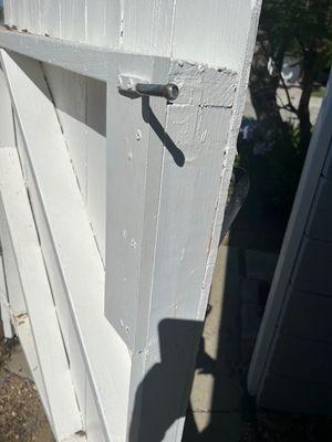 Gate was completely jammed before repair.