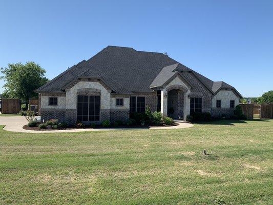 Trimmed bushes and put mulch down! House cleaned up super nice.