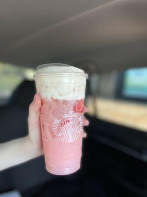 Pink drink with peach juice raspberry syrup sweet cream foam