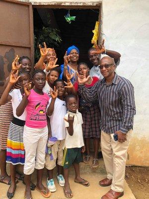 Yanay Boayue Sr with children in Liberian.