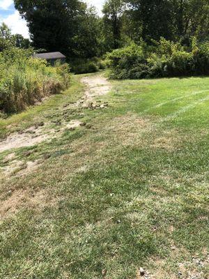 No real cart paths...mostly dirt, rocks and a VERY bumpy ride and brutal on your clubs banging into each other in your bag