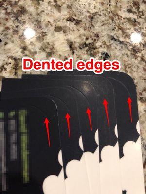 Dented edges from the cards being placed in the cutting machine improperly