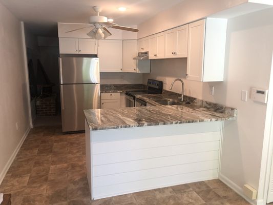 Kitchen. Partial renovation (did not do floors).