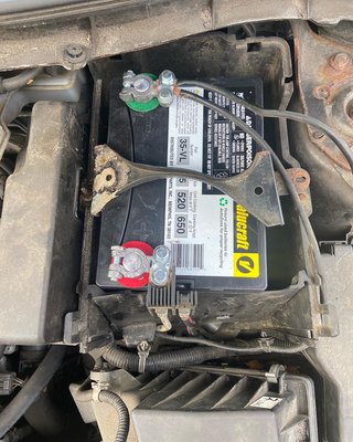 Battery replacement for car stuck on side of road.