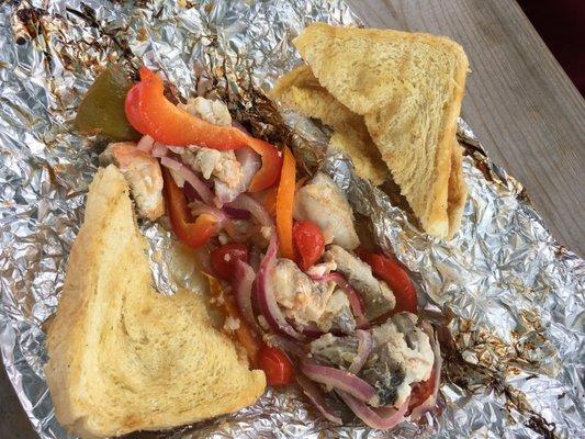 Whitefish in foil with veggies and garlic toast