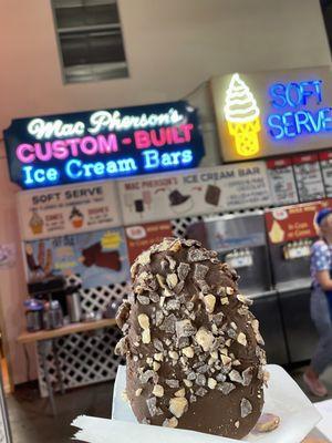 CLASSIC vanilla ice cream bar dipped in chocolate and rolled in Heath Bar!