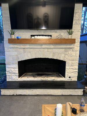 Inside of fireplace, and mantle stained