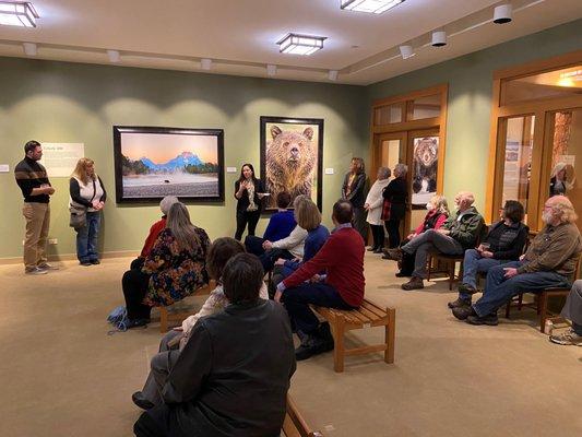 Curator, Maria Ferguson, discussing a recent exhibit.