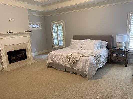 Clean master bedroom & freshly made bed