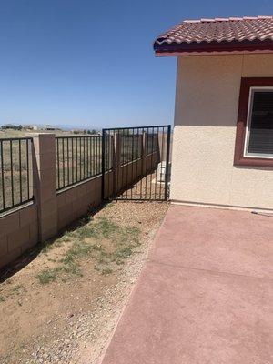 Side fence and safety screens over the original fencing for the pool area.