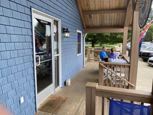 Outside dining on their large  porch